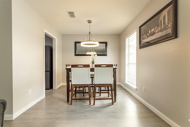 dining area featuring light hardwood / wood-style floors