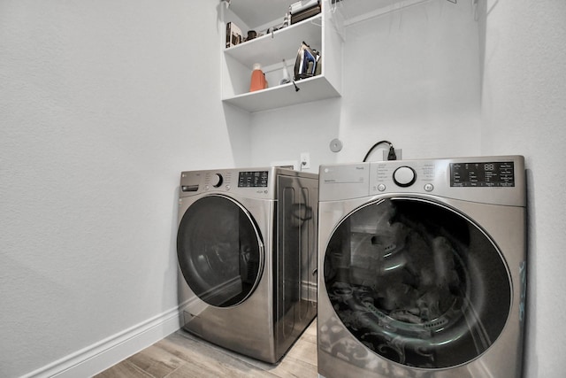 laundry area featuring independent washer and dryer