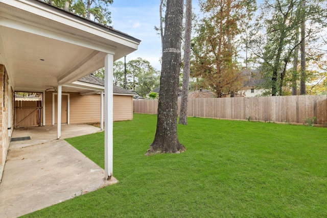 view of yard featuring a patio and fence