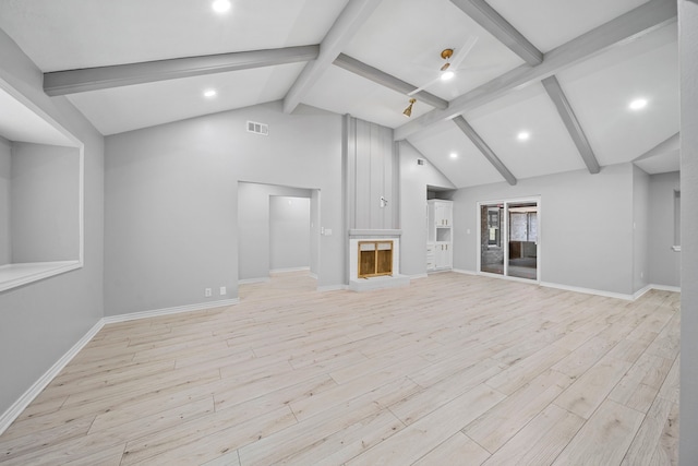 unfurnished living room featuring beam ceiling, ceiling fan, high vaulted ceiling, and light hardwood / wood-style floors