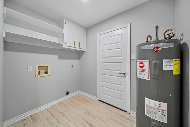 laundry room featuring water heater, cabinets, hookup for a washing machine, hookup for an electric dryer, and light wood-type flooring