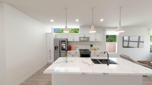 kitchen with stainless steel appliances, a kitchen island with sink, and pendant lighting