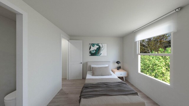 bedroom featuring light hardwood / wood-style floors