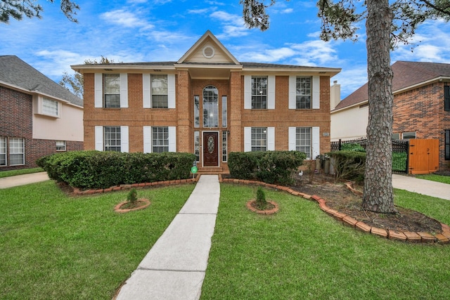 view of front of property with a front lawn