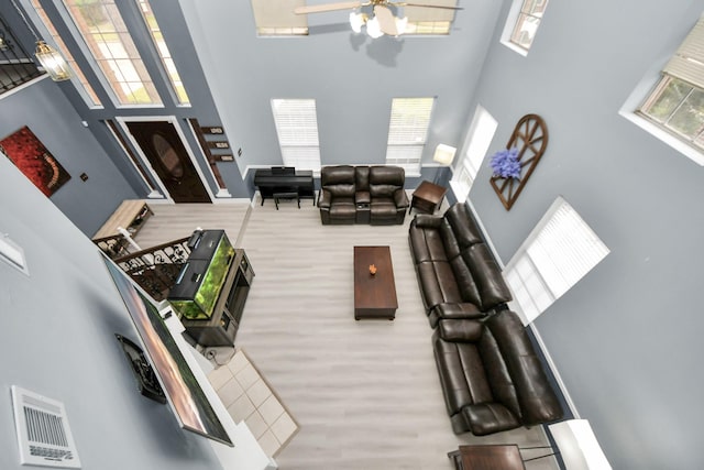 living room with a towering ceiling