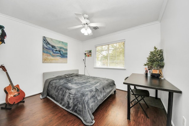 bedroom with dark wood-type flooring, ceiling fan, and crown molding