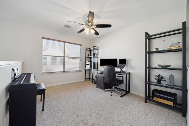 carpeted office with ceiling fan