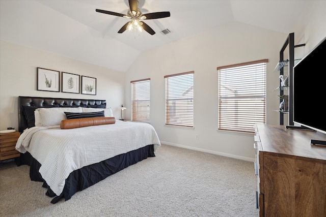 bedroom featuring ceiling fan, vaulted ceiling, and carpet flooring