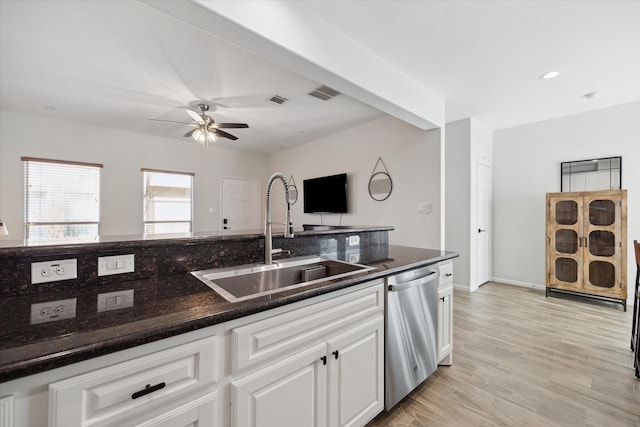 kitchen with sink, white cabinetry, ceiling fan, light hardwood / wood-style floors, and stainless steel dishwasher