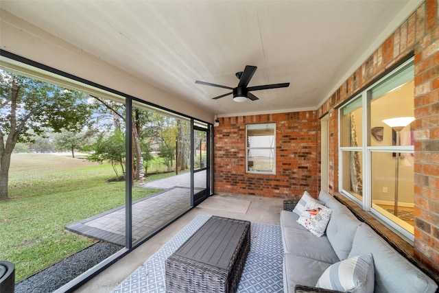 sunroom / solarium with ceiling fan