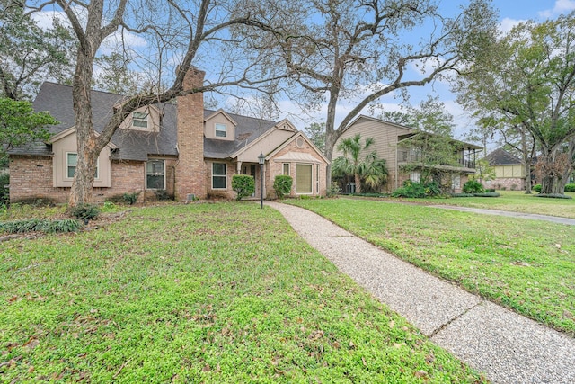 view of front of house with a front lawn