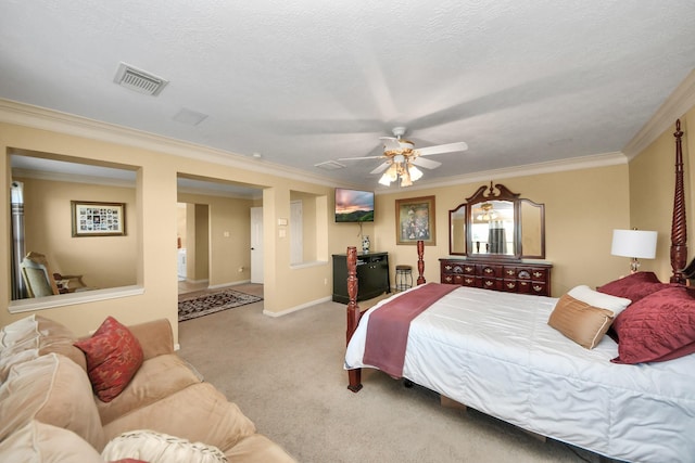 bedroom featuring ceiling fan, light colored carpet, ornamental molding, and a textured ceiling