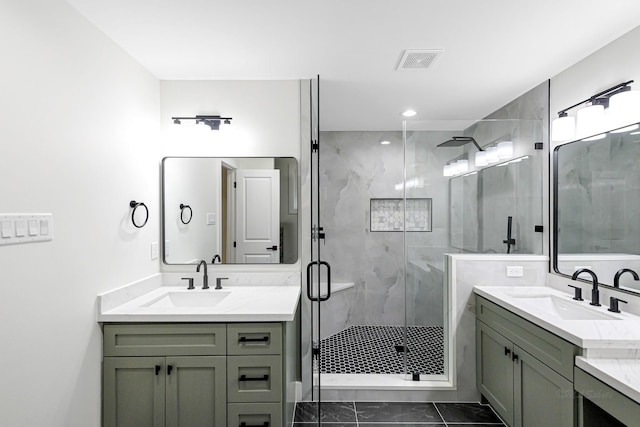 bathroom featuring vanity and a shower with door