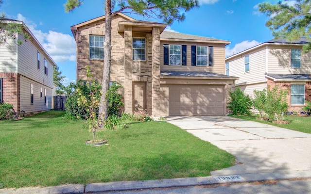 view of front facade featuring a garage and a front lawn