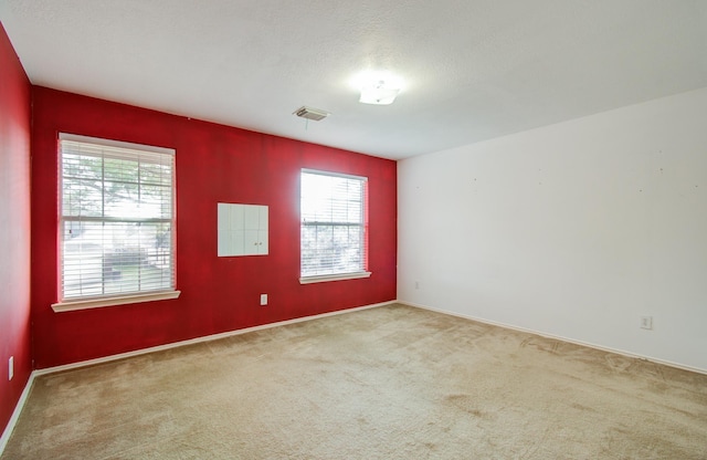 unfurnished room with carpet