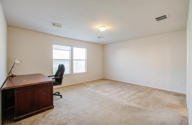 view of carpeted office space