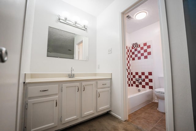 full bathroom with toilet, vanity, and  shower combination