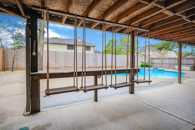 view of swimming pool with a patio