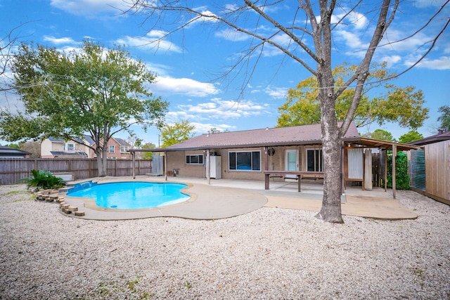 view of pool featuring a patio