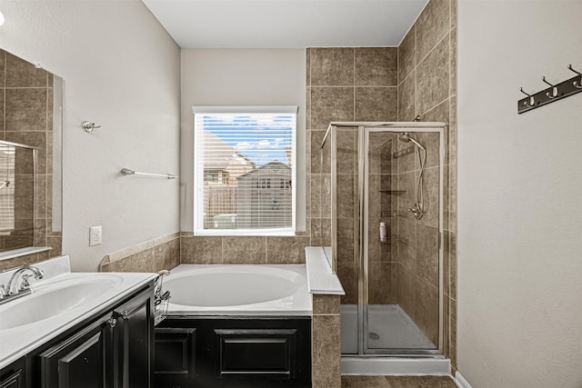 bathroom with vanity, tile patterned flooring, and independent shower and bath