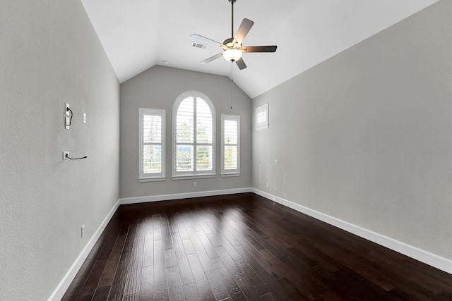 unfurnished room with dark wood-type flooring, ceiling fan, and lofted ceiling