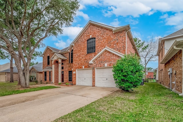 view of front property with a garage and a front lawn