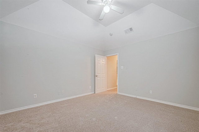 empty room featuring ceiling fan and light colored carpet