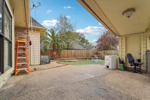 view of patio featuring central air condition unit, pool water feature, ac unit, and a fenced in pool