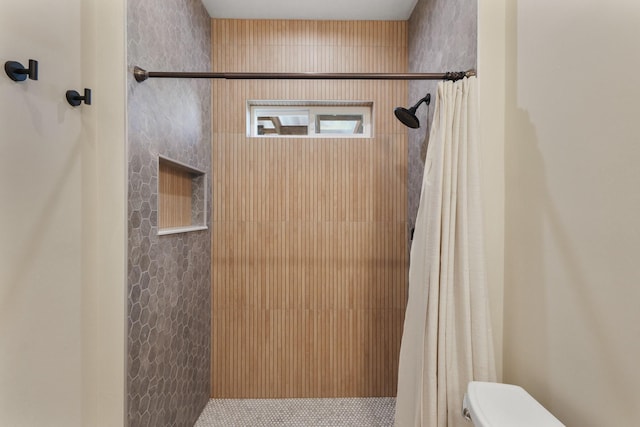 bathroom with a shower with curtain