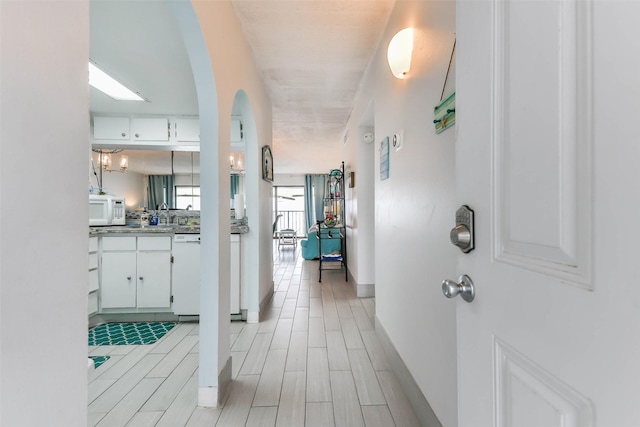 hall featuring light hardwood / wood-style flooring