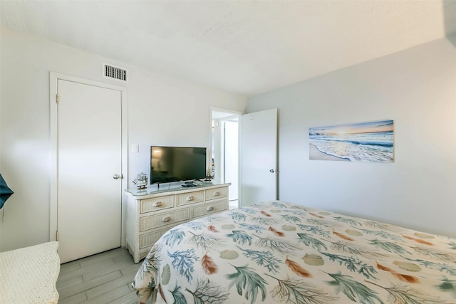 bedroom featuring light wood-type flooring