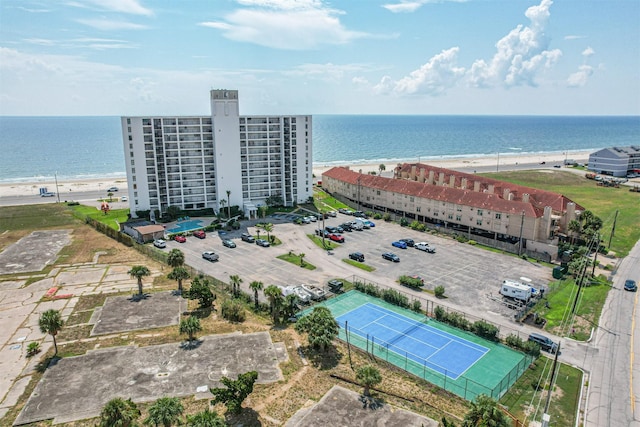 aerial view featuring a beach view and a water view