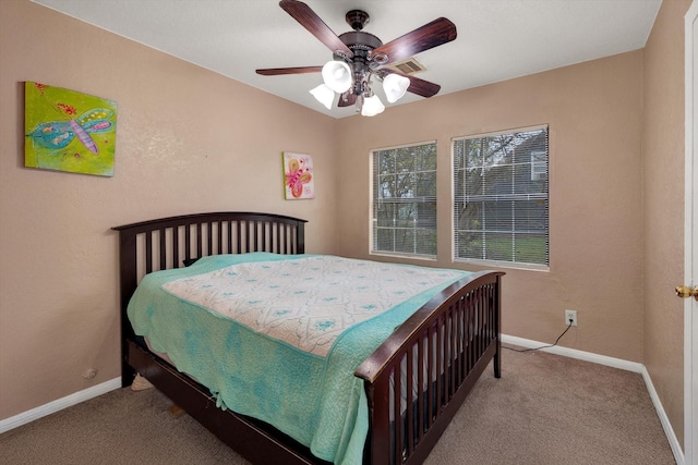 bedroom with light colored carpet and ceiling fan