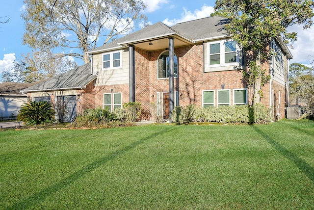 view of front of home with a front lawn and cooling unit