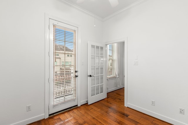 entryway featuring french doors, ceiling fan, ornamental molding, and wood-type flooring