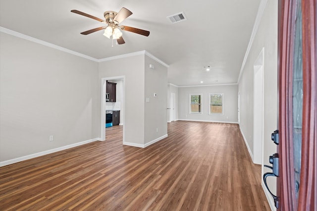 unfurnished living room with ceiling fan, dark hardwood / wood-style flooring, and ornamental molding