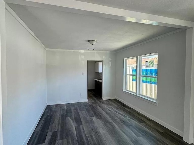 spare room with dark hardwood / wood-style flooring