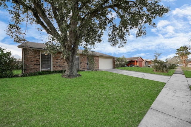 single story home with a front lawn and a garage