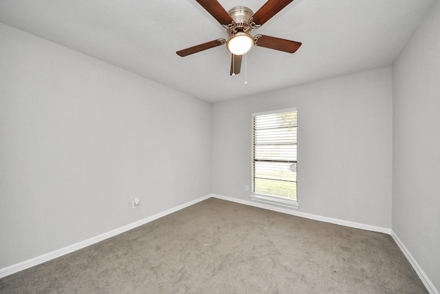 empty room with carpet and ceiling fan