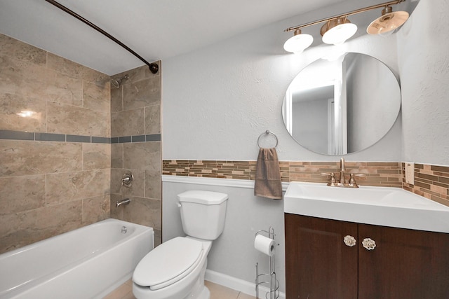 full bathroom with toilet, tiled shower / bath combo, backsplash, and vanity