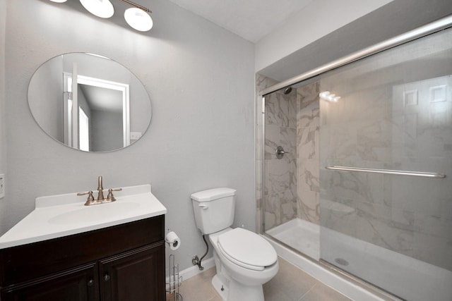 bathroom with toilet, tile patterned flooring, an enclosed shower, and vanity