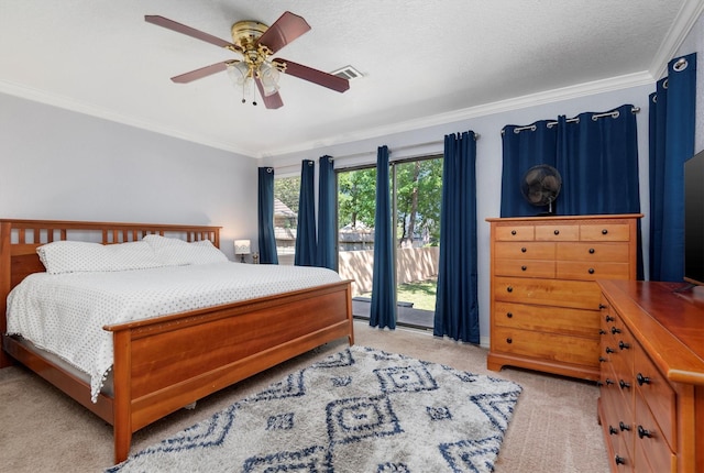 bedroom with a textured ceiling, light colored carpet, crown molding, ceiling fan, and access to exterior