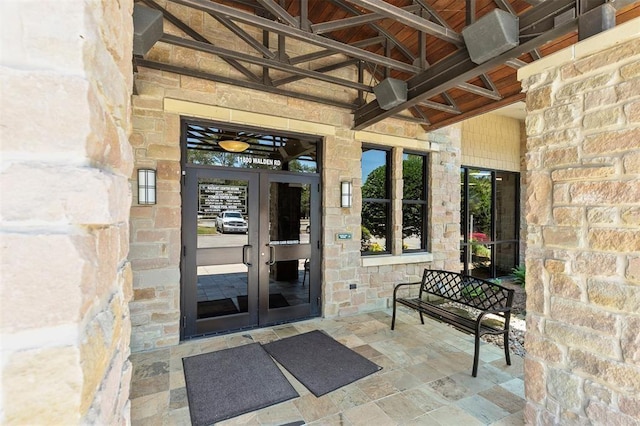 entrance to property featuring french doors