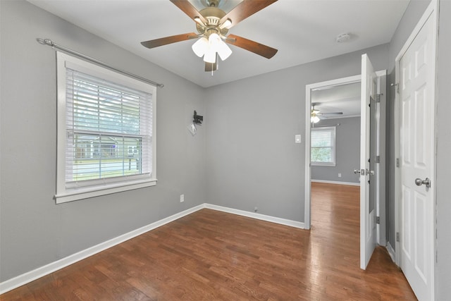 empty room with wood-type flooring