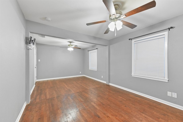 spare room featuring hardwood / wood-style floors