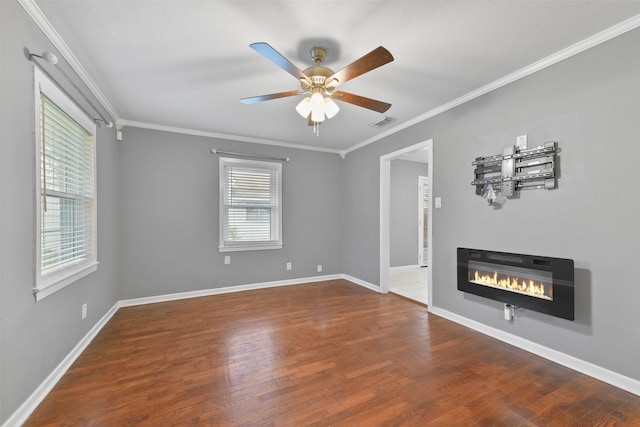 unfurnished living room with ceiling fan, hardwood / wood-style floors, and crown molding