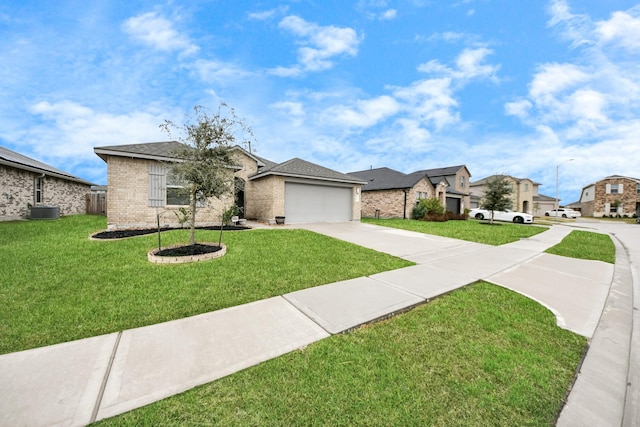 view of front facade with central air condition unit, a front lawn, and a garage