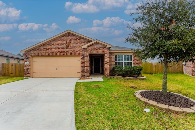 view of front of house featuring a garage and a front lawn