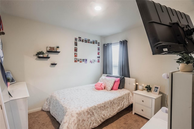 bedroom with light carpet