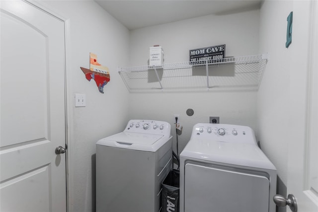 washroom with washer and clothes dryer